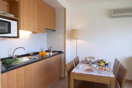 One-Bedroom Apartment with Balcony and Pool View