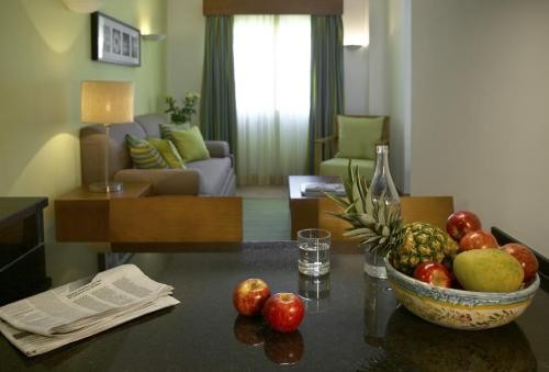One-Bedroom Apartment with Balcony and City View